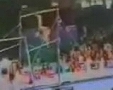 breakcomGymnastFlipsOntoHead.jpg